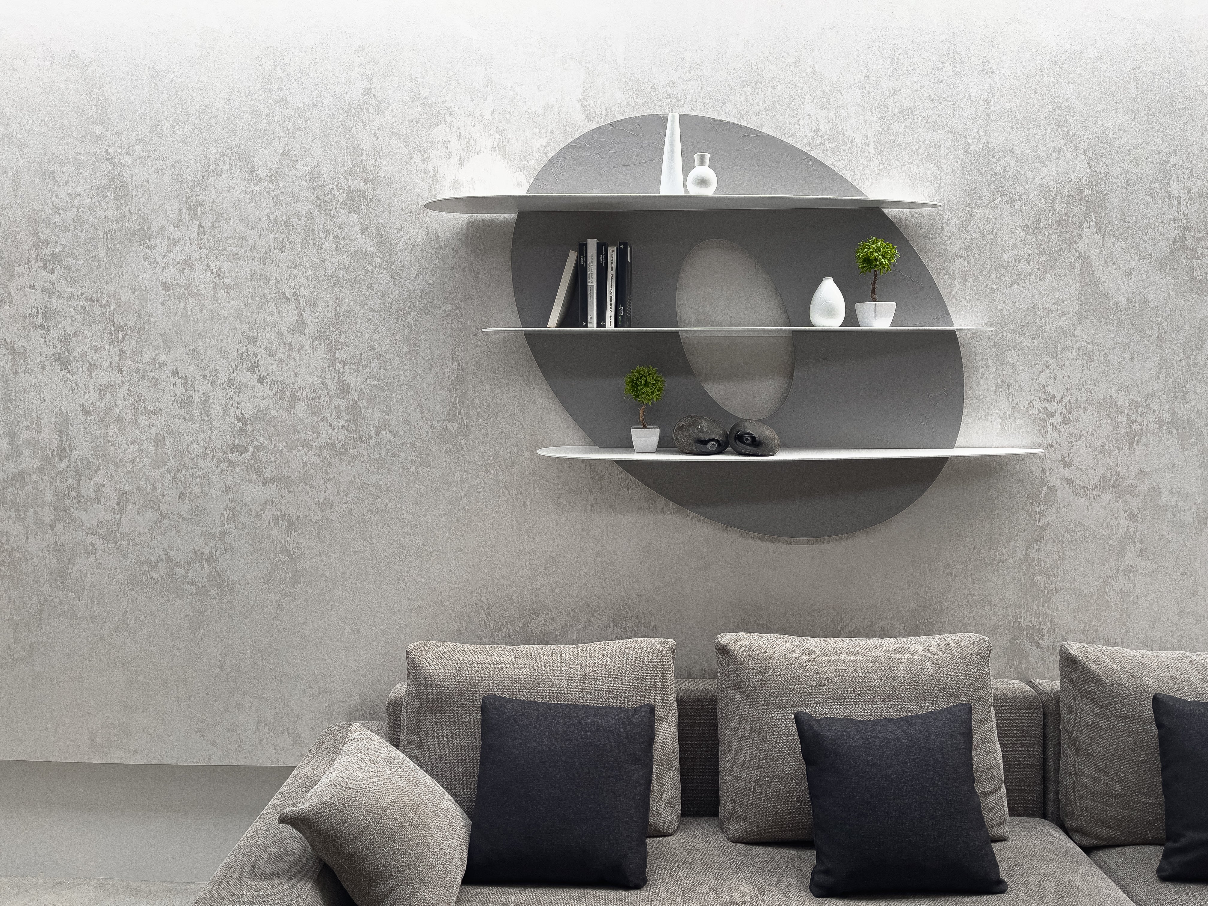 bookcase over sofa in white and grey